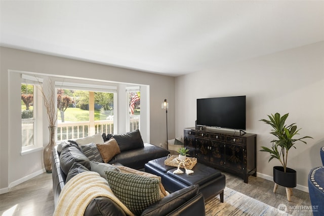 8957 Watson Pl NE, Bremerton, WA 98311 - living area with baseboards and wood finished floors