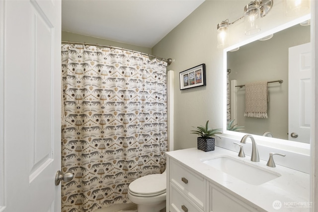 8957 Watson Pl NE, Bremerton, WA 98311 - full bathroom featuring toilet, vanity, and a shower with curtain