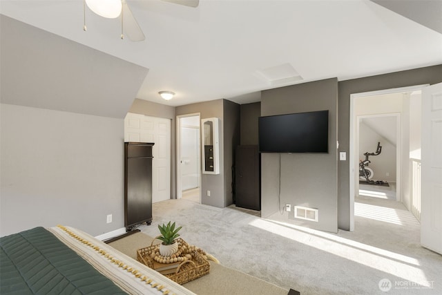 8957 Watson Pl NE, Bremerton, WA 98311 - bedroom featuring ceiling fan, connected bathroom, visible vents, and light colored carpet