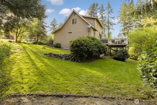 8957 Watson Pl NE, Bremerton, WA 98311 - view of property exterior featuring a deck and a lawn