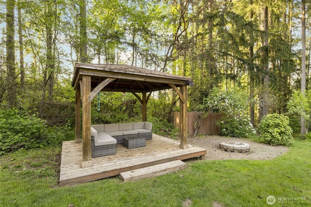 8957 Watson Pl NE, Bremerton, WA 98311 - view of yard with an outdoor living space with a fire pit, fence, a gazebo, and a deck