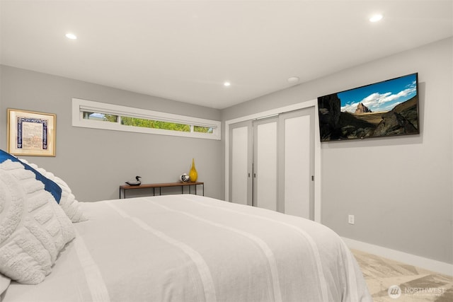 807 Lake St S Unit 300, Kirkland, WA 98033 - bedroom featuring recessed lighting, baseboards, and a closet