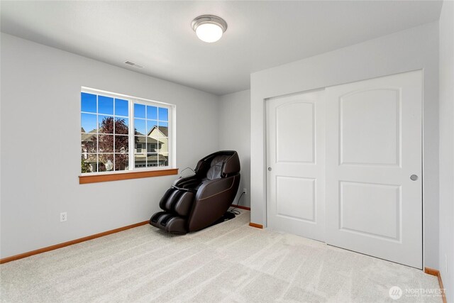 unfurnished room featuring baseboards and carpet floors