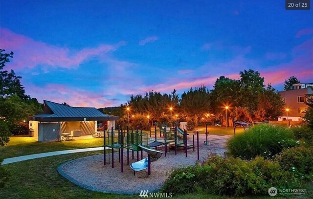 communal playground featuring a yard