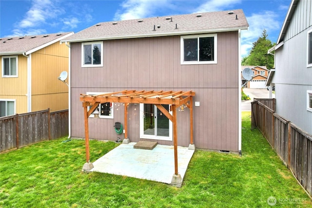 rear view of property with a lawn, a pergola, a patio, and a fenced backyard
