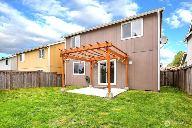 rear view of house featuring a lawn, a fenced backyard, a patio area, and a pergola