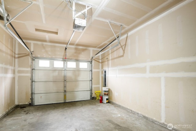 garage featuring a garage door opener