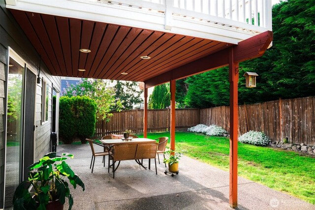 view of patio / terrace featuring a fenced backyard and outdoor dining space