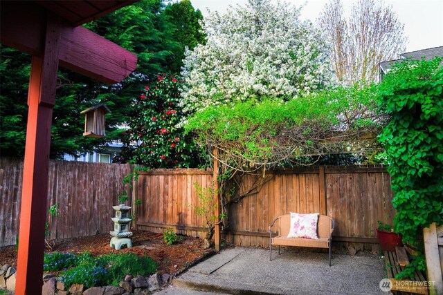 view of patio featuring fence