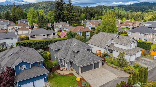 1618 Hoquiam Pl NE, Renton, WA 98059 - aerial perspective of suburban area with a forest