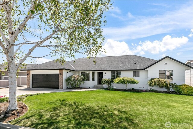 5208 Tumac Dr, Yakima, WA 98901 - single story home with an attached garage, a front lawn, roof with shingles, and concrete driveway