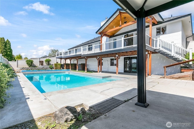 5208 Tumac Dr, Yakima, WA 98901 - view of swimming pool featuring a patio, a fenced in pool, a fenced backyard, and stairs