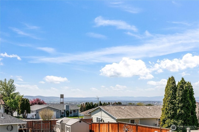 5208 Tumac Dr, Yakima, WA 98901 - view of water feature featuring fence, a mountain view, and a residential view