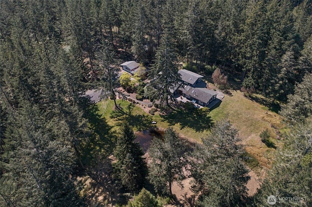 aerial view featuring a forest view