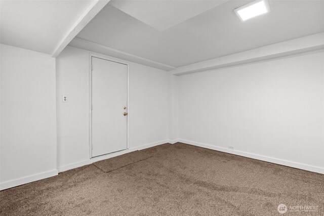 finished below grade area with baseboards and carpet