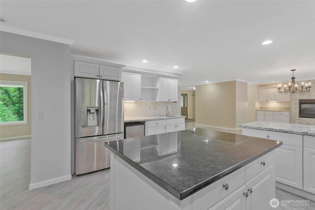 kitchen featuring open shelves, baseboards, dishwashing machine, stainless steel refrigerator with ice dispenser, and tasteful backsplash