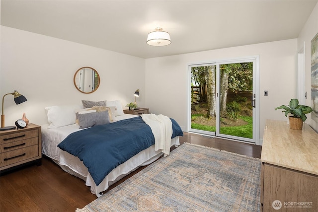 bedroom featuring dark wood finished floors