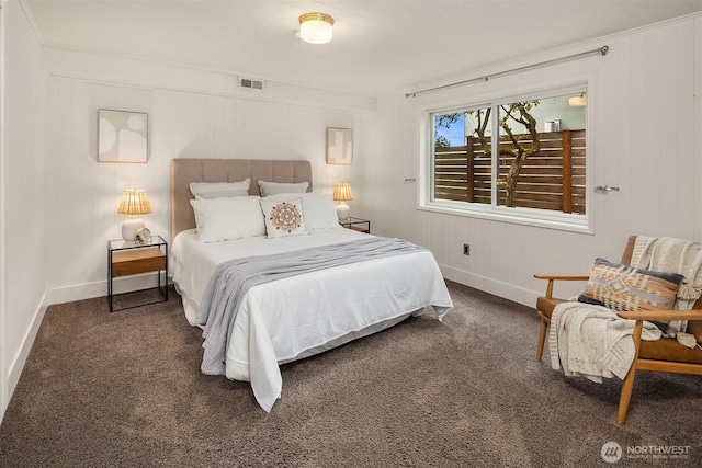 bedroom featuring carpet flooring and baseboards