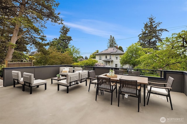 view of patio with an outdoor living space and outdoor dining space