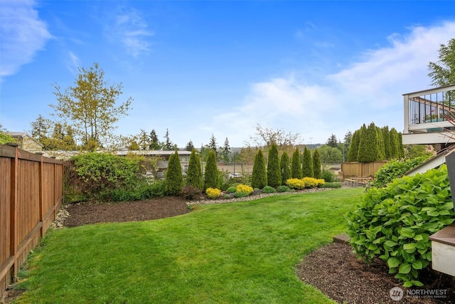 view of yard with fence