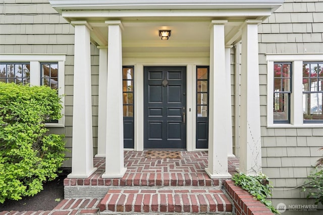 1238 E Newton St, Seattle, WA 98102 - view of exterior entry with a porch