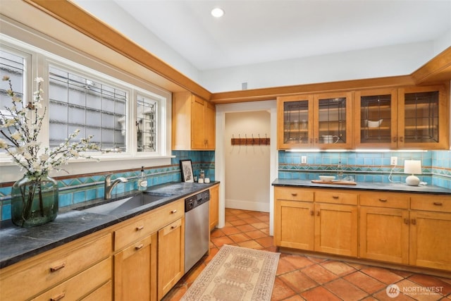 1238 E Newton St, Seattle, WA 98102 - kitchen featuring stainless steel dishwasher, a sink, backsplash, and light tile patterned floors