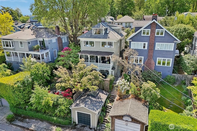 1238 E Newton St, Seattle, WA 98102 - view of front of house featuring a chimney and a garage
