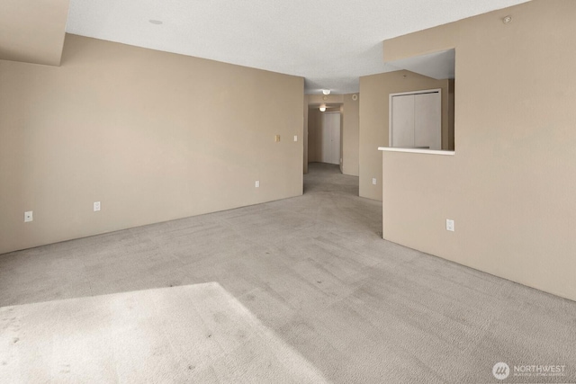empty room featuring carpet floors