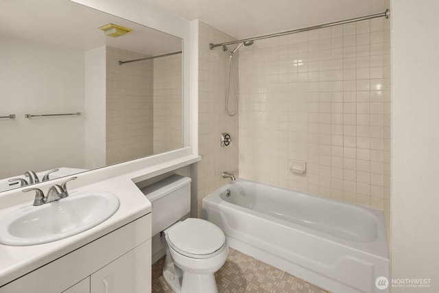 bathroom with vanity, toilet, and tub / shower combination