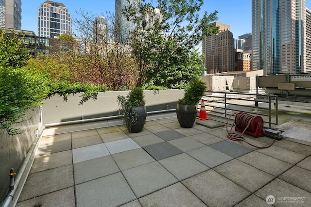 view of patio with a city view