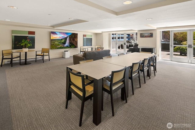 dining area featuring recessed lighting, french doors, carpet, and a baseboard radiator