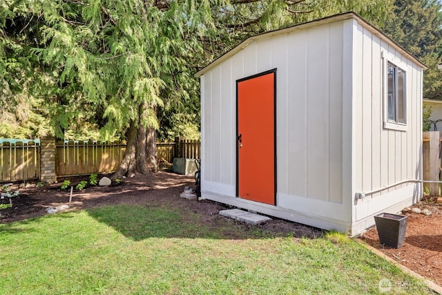 view of shed featuring a fenced backyard