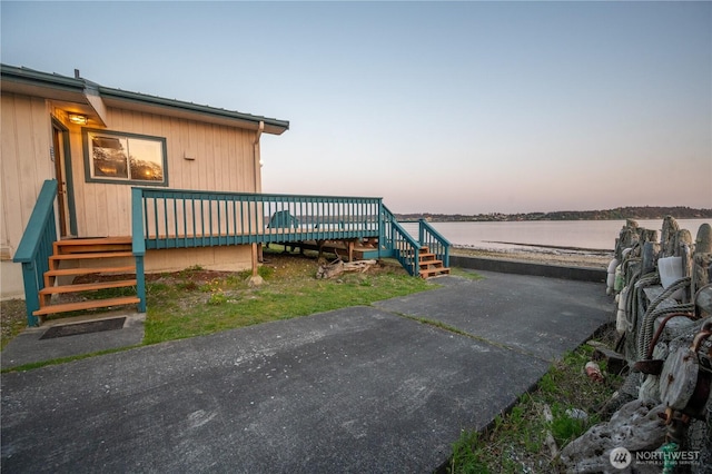 1409 Fossil Ln, Oak Harbor, WA 98277 - view of patio / terrace featuring a deck with water view