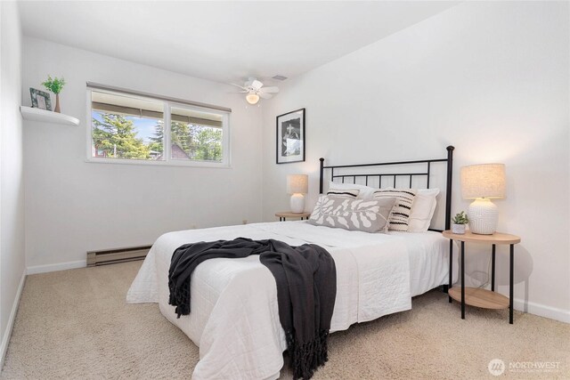bedroom featuring baseboards, carpet, baseboard heating, and visible vents