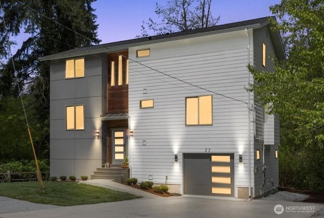 modern home with a garage and driveway