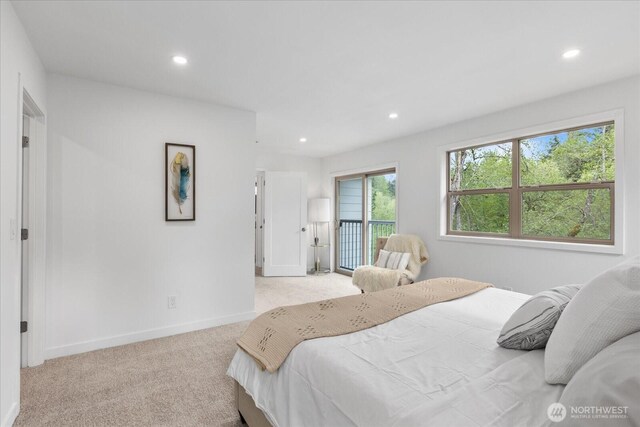 carpeted bedroom with recessed lighting, baseboards, and access to outside