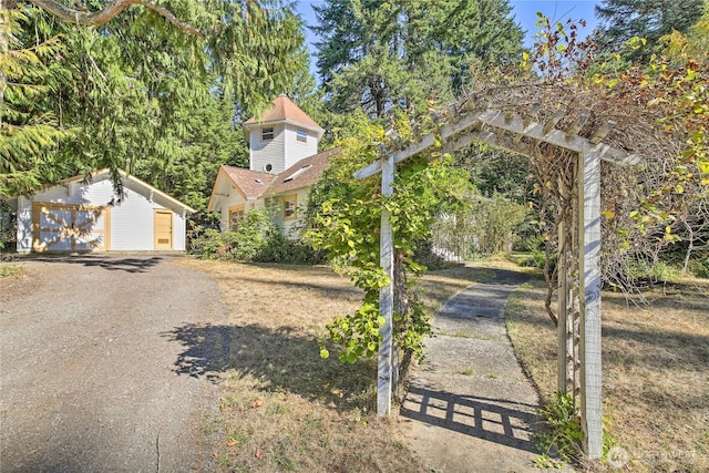 33823 State Route 706 Unit 1, Ashford, WA 98304 - exterior space with a garage and an outbuilding