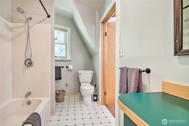 33823 State Route 706 Unit 1, Ashford, WA 98304 - bathroom featuring shower / tub combination, baseboards, tile patterned floors, and toilet
