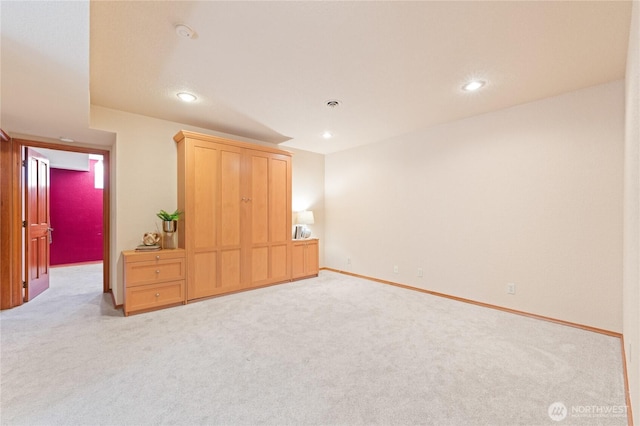 313 Willapa Pl, La Conner, WA 98257 - unfurnished bedroom featuring baseboards, light carpet, and recessed lighting