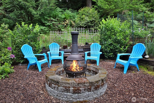 1180 Cedar Cir, Langley, WA 98260 - view of patio / terrace with an outdoor fire pit