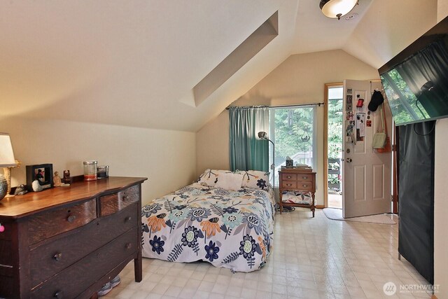 1180 Cedar Cir, Langley, WA 98260 - bedroom with lofted ceiling and access to exterior