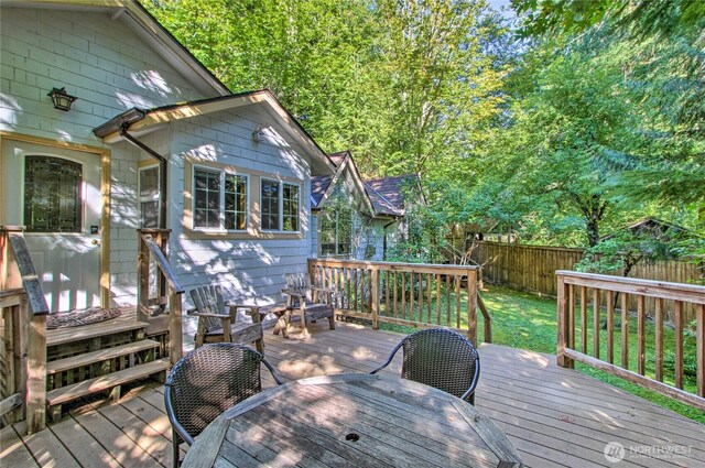 33823 State Route 706 E Unit 2, Ashford, WA 98304 - wooden terrace featuring a fenced backyard and a yard