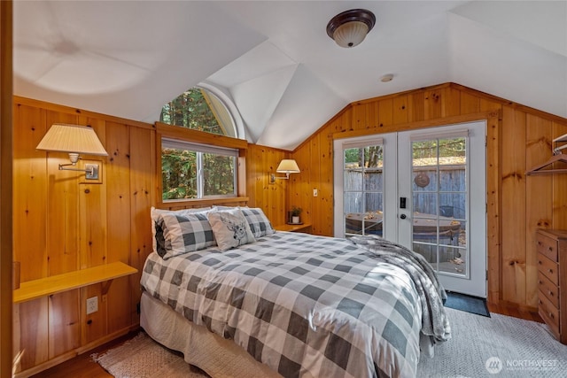 33823 State Route 706 E Unit 2, Ashford, WA 98304 - bedroom with wood walls, access to exterior, french doors, and lofted ceiling