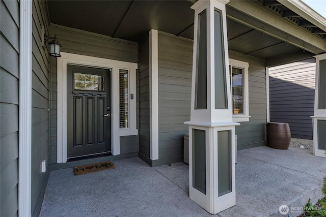 entrance to property with a porch