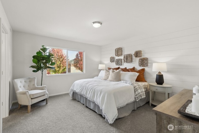 carpeted bedroom with baseboards