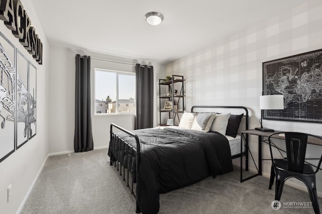 bedroom with baseboards, carpet floors, and wallpapered walls