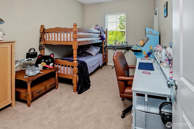 bedroom featuring light colored carpet