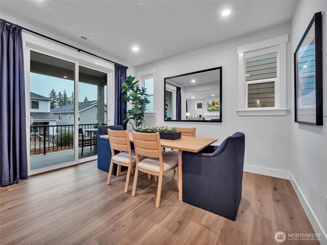 dining area featuring recessed lighting, baseboards, visible vents, and wood finished floors