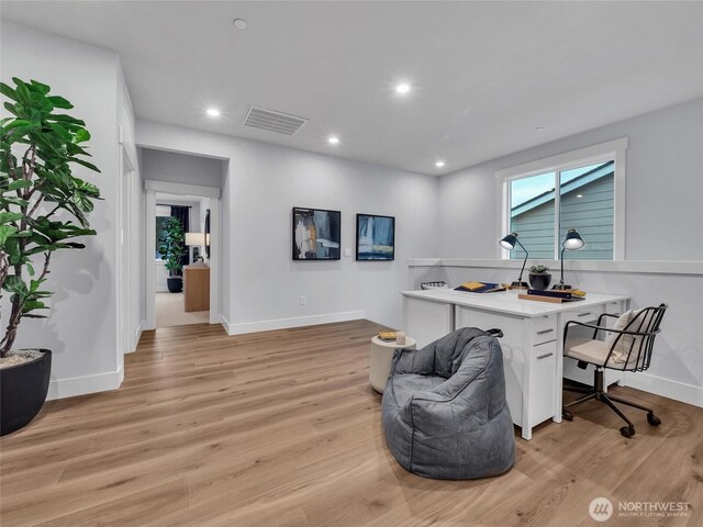 home office with visible vents, recessed lighting, light wood-style floors, and baseboards
