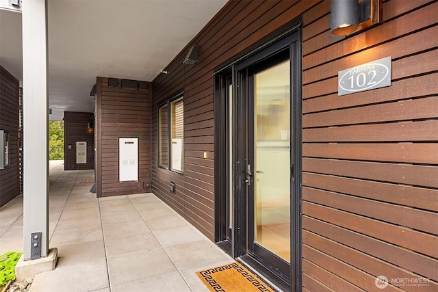 property entrance with a patio